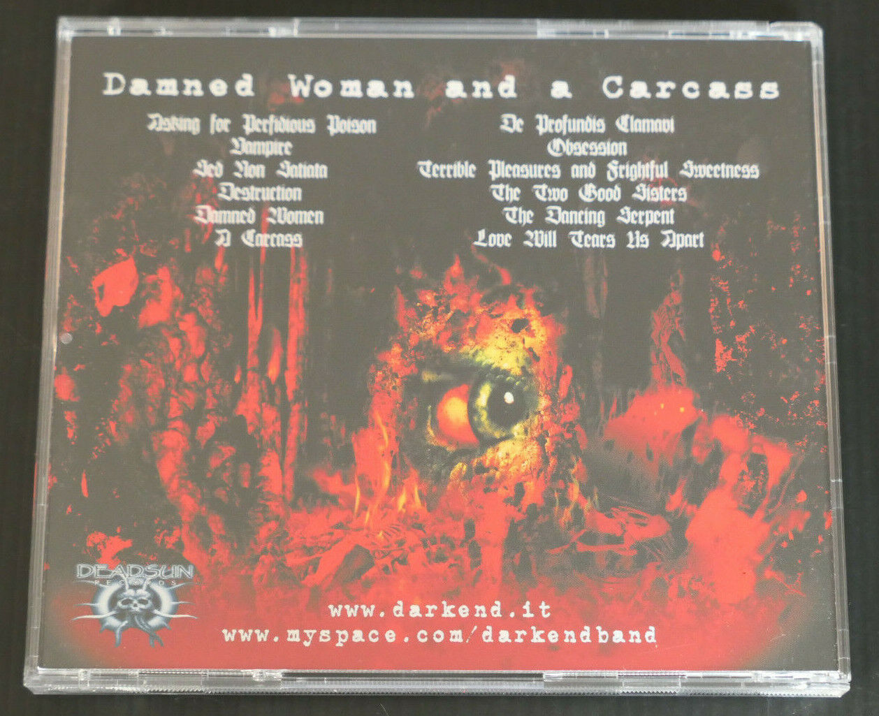 CD DARK END / DAMNED WOMAN AND A CARCASS / DEADSUN RECORDS