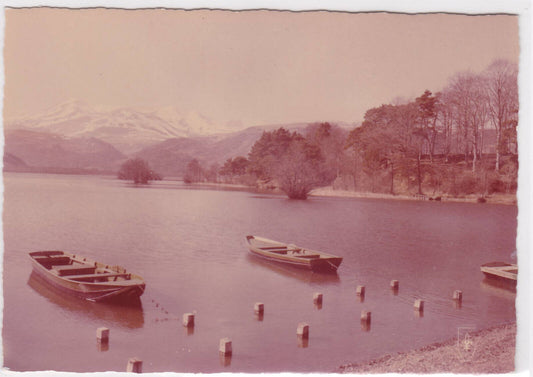 CPM POSTCARD OF LAKE CHAMBON AND THE SNOW-COVERED SANCY MASSIF AUVERGNE 