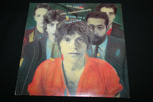 KIM LARSEN AND JUNGLEDREAMS   LP 33T 12"   SITTING ON A TIME BOMB   1982