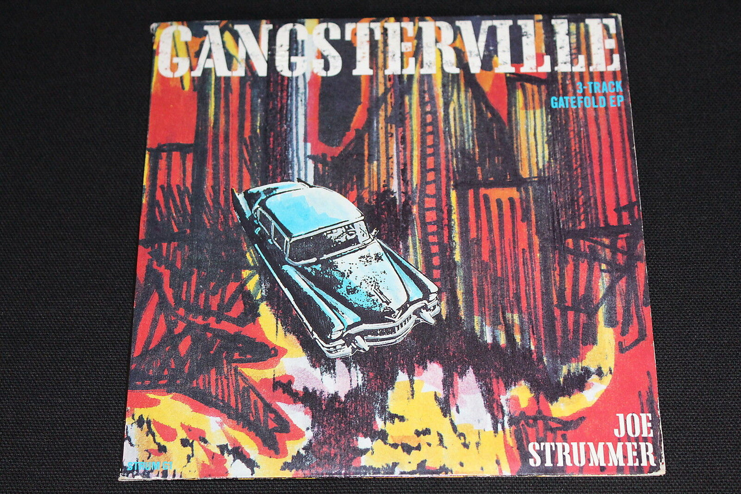 JOE STRUMMER   EP 45T 7"   GANGSTERVILLE   3-TRACK GATEFOLD EP   1989   UK